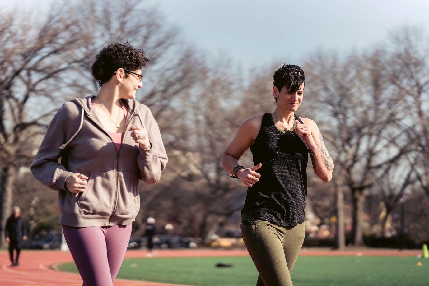 Two women exercising in a park